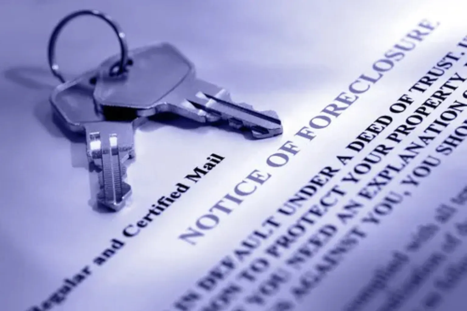 A foreclosure notice and a set of keys.